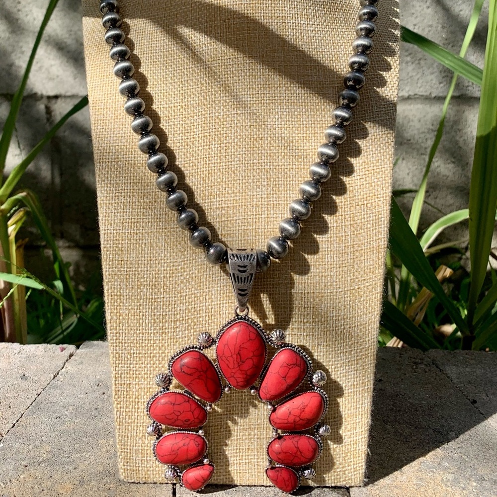 Red squash blossom necklace